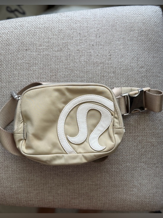 lululemon athletica Handbags - Lululemon Vintage Beige Crossbody Sling Bag Oversized Logo